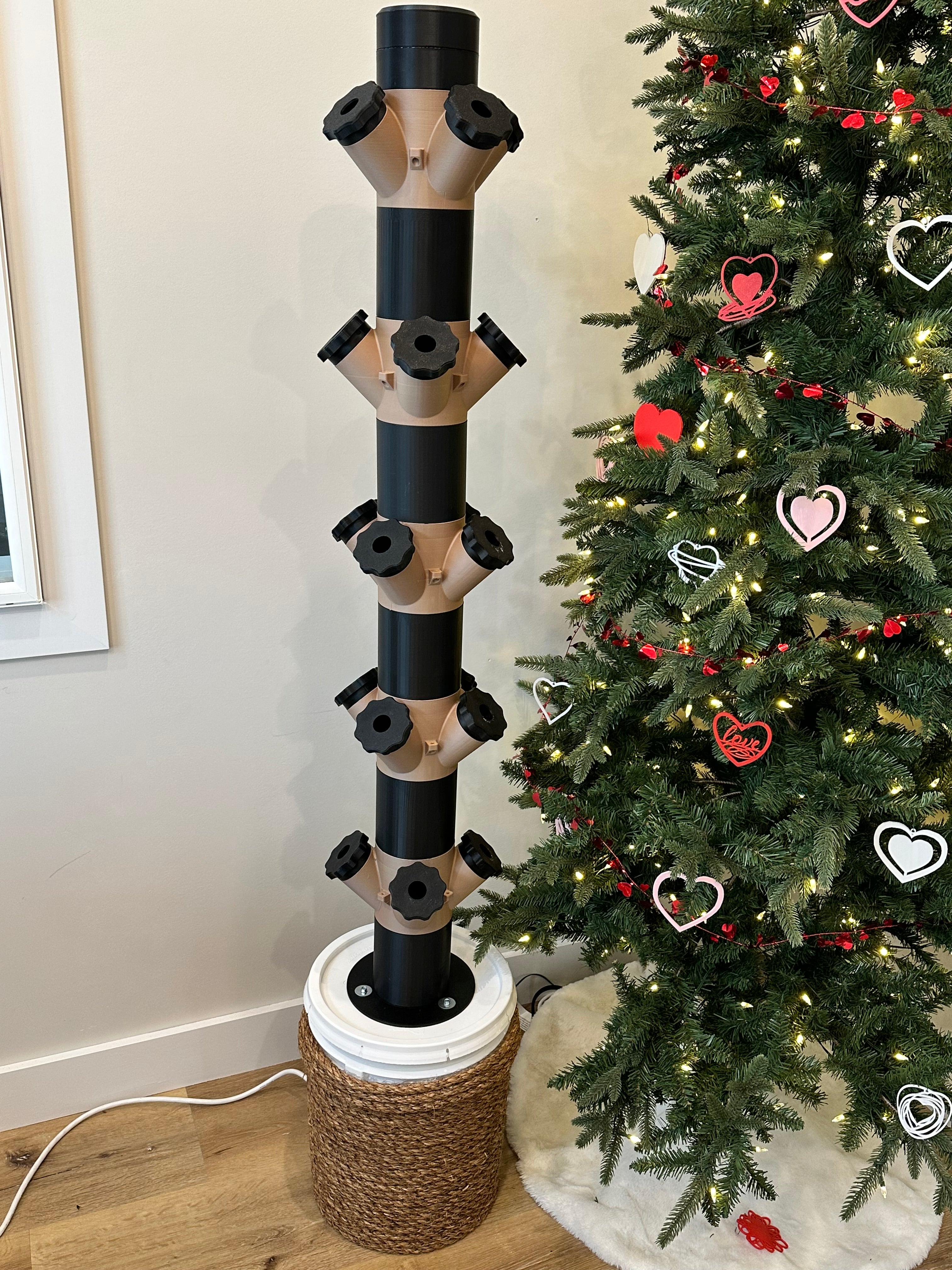 Side view of 4 tier aeroponic grow tower showing stacked design
