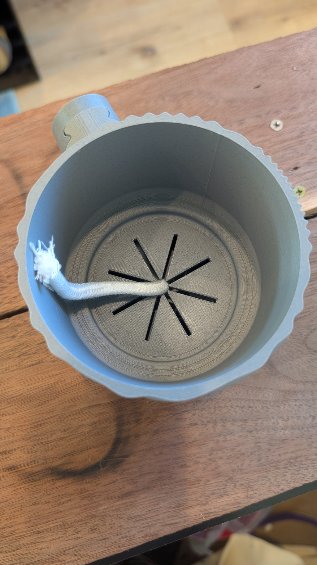 Close-up of Zen Wave wall planter showing wave texture
