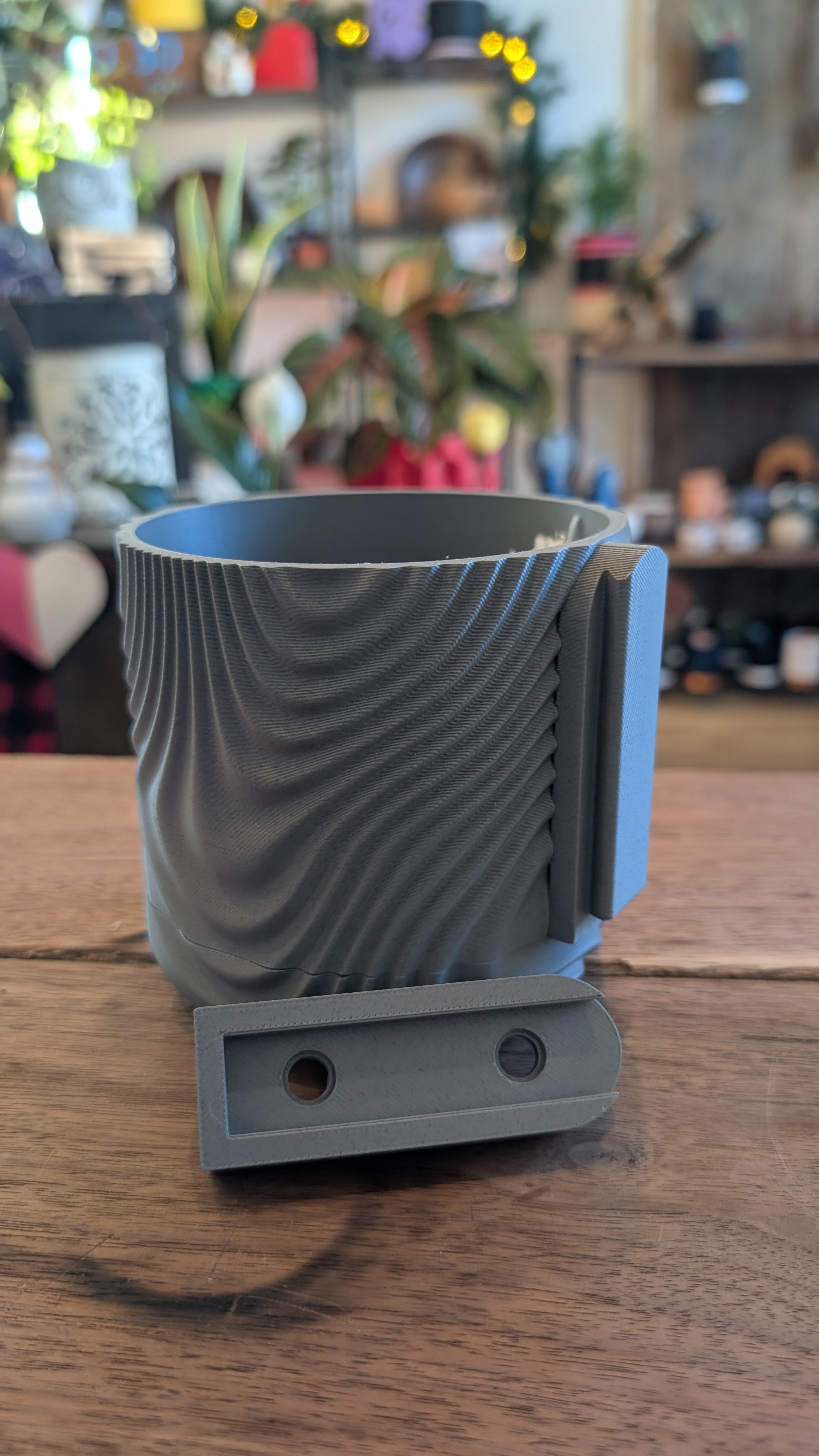 Modern wall planter sized for small indoor plants and succulents
